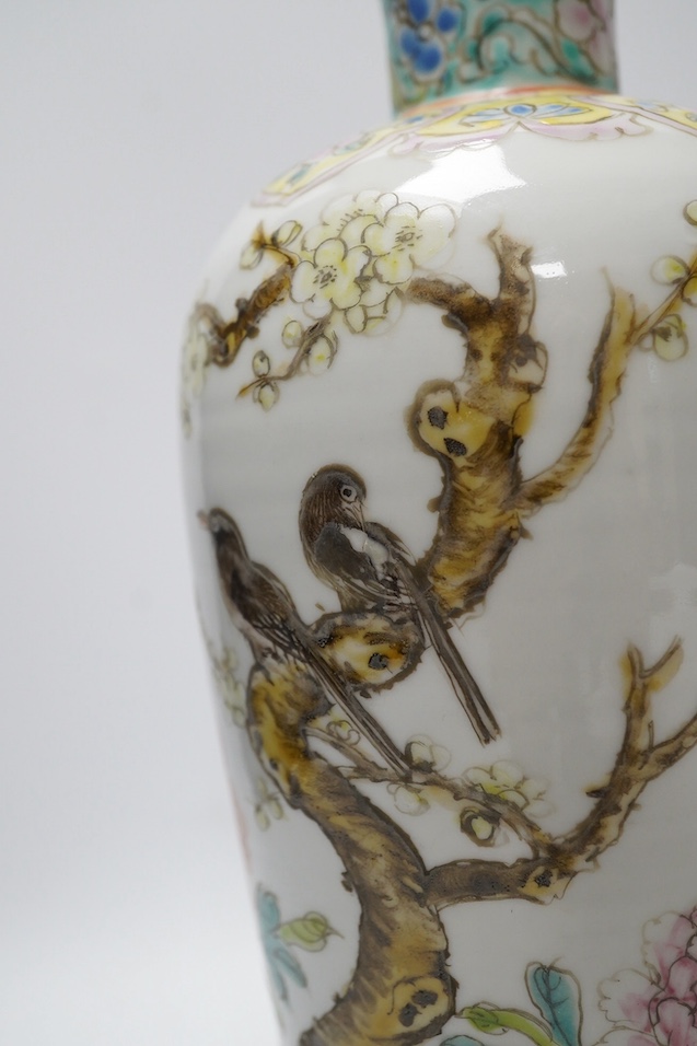 A pair of Chinese famille rose tapering vases, Qianlong mark but later, 23cm. Condition - good